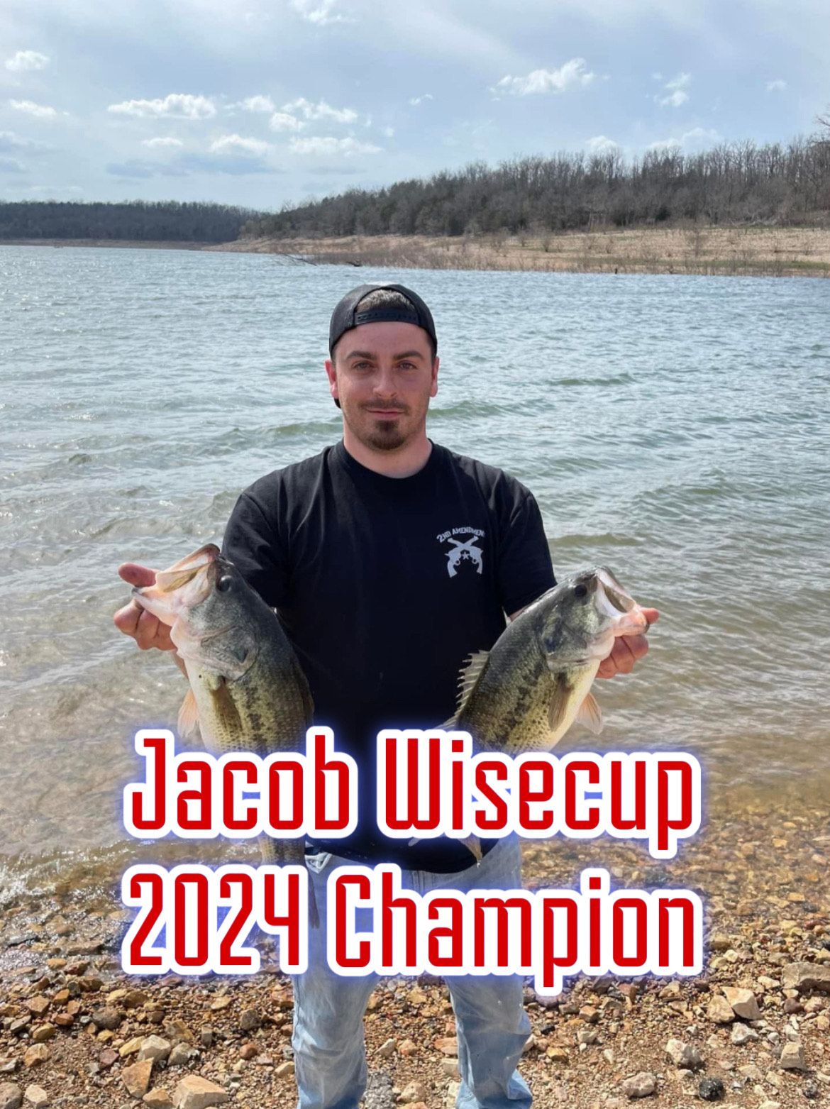 Man holding two fish by a lake with text: “Jacob Wisecup 2024 Champion”