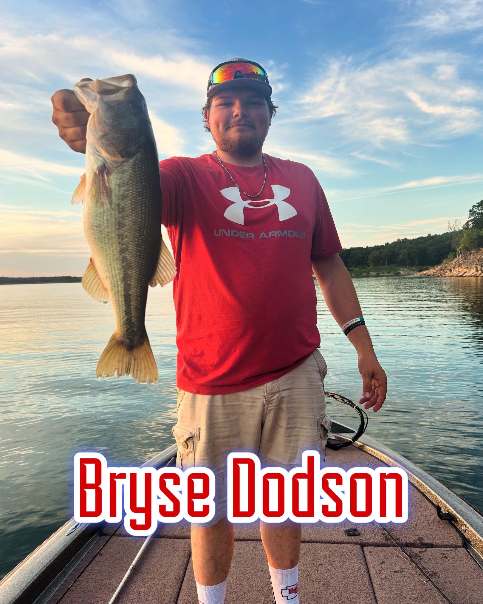 Man on a dock holding a large fish at sunset, with the name “Bryse Dodson” overlaid.