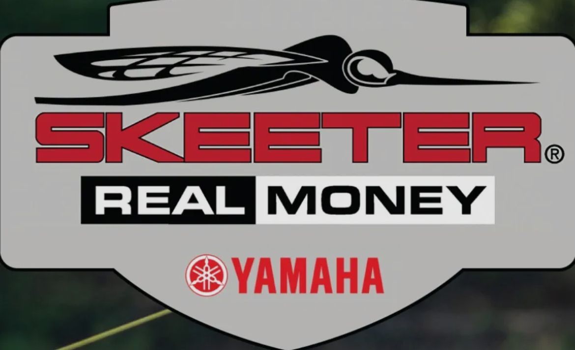 Skeeter Real Money Yamaha logo with black, red, and white text on a gray shield-shaped sign