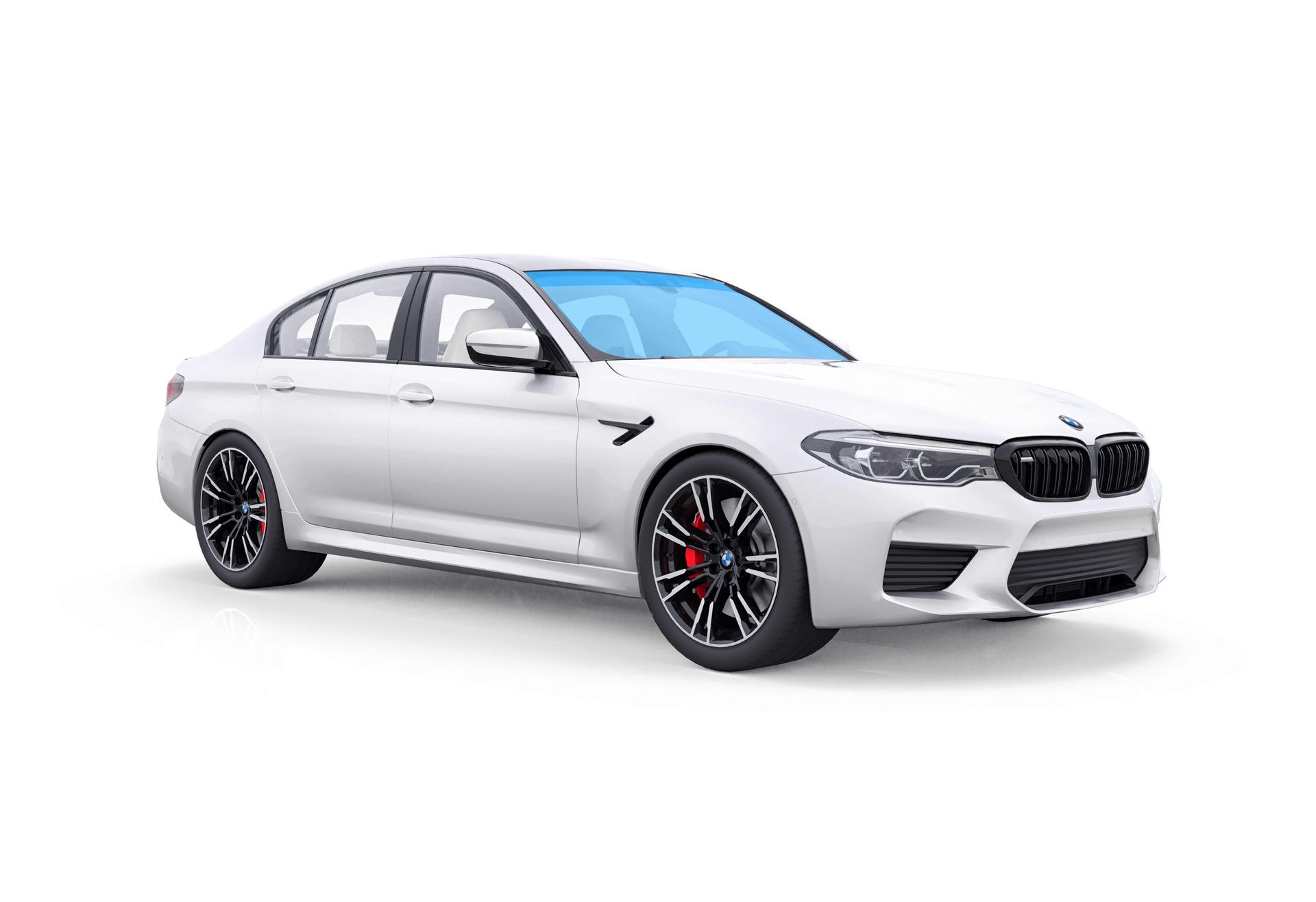 White BMW M5 sedan with black wheels and red brake calipers.
