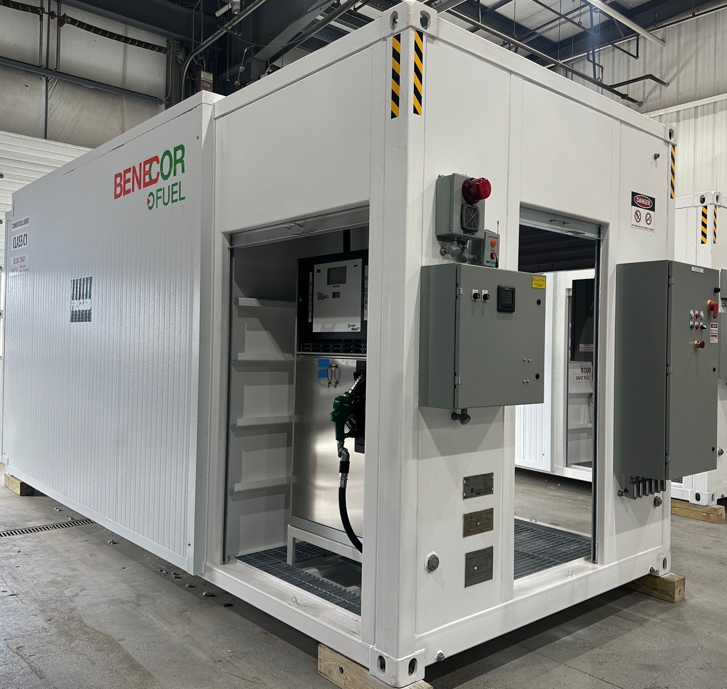 White fuel container with pump and control panels. The word 