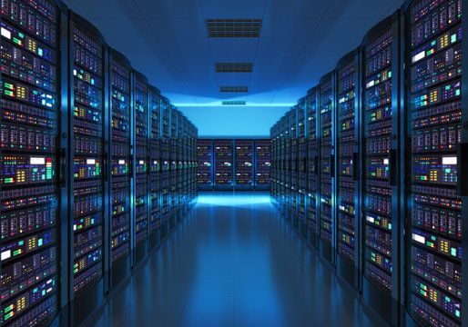 Rows of servers in a blue-lit data center.