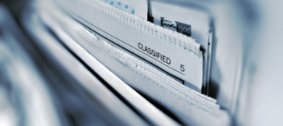 Close-up of file folders labeled
