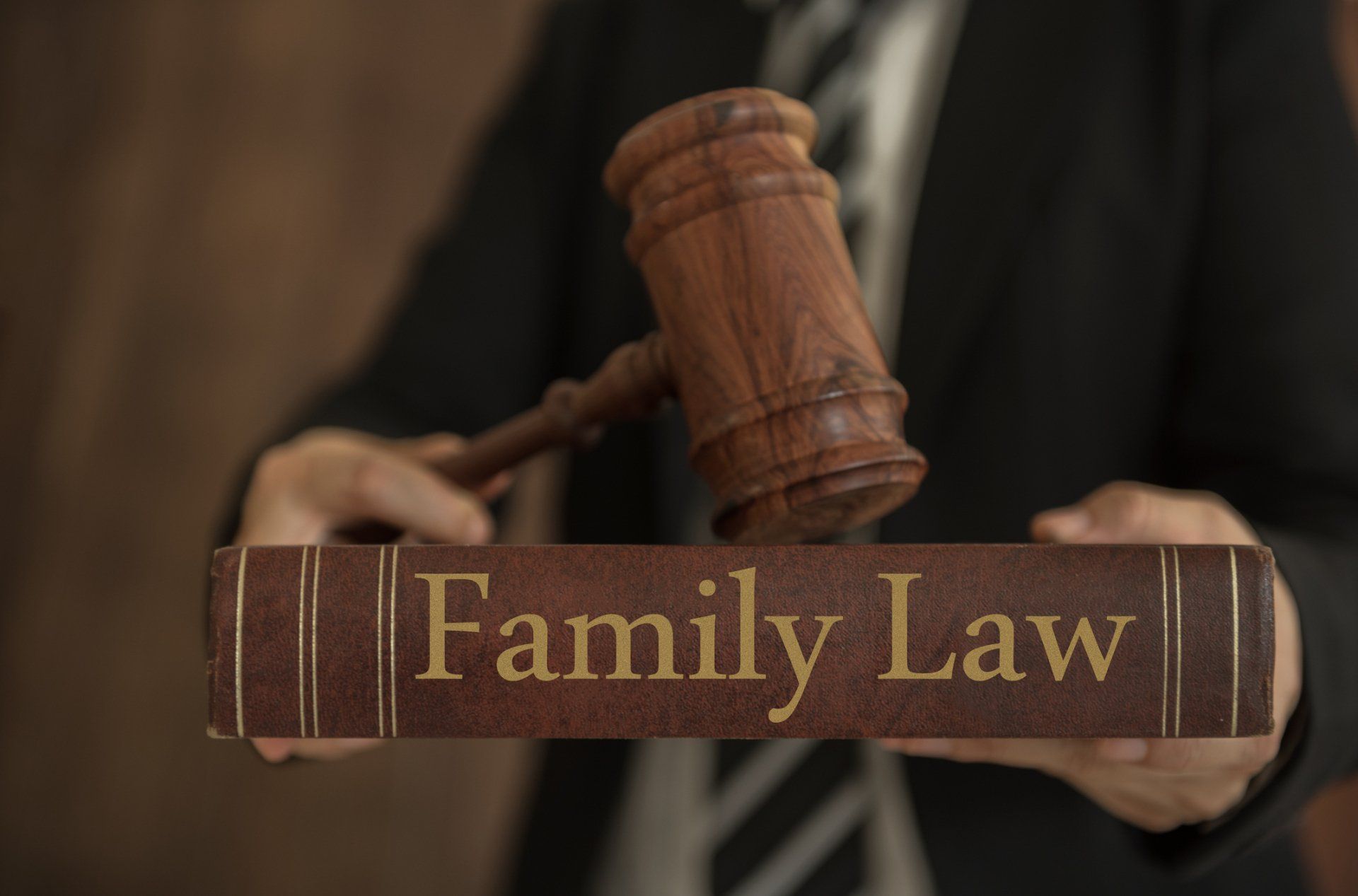 Family Figure And Gavel — Brunswick, GA — Wallace E. Harrell III, Attorney at Law Family Figure And Gavel — Brunswick, GA — Wallace E. Harrell III, Attorney at Law