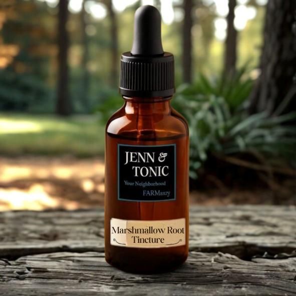 An amber glass dropper bottle labeled 