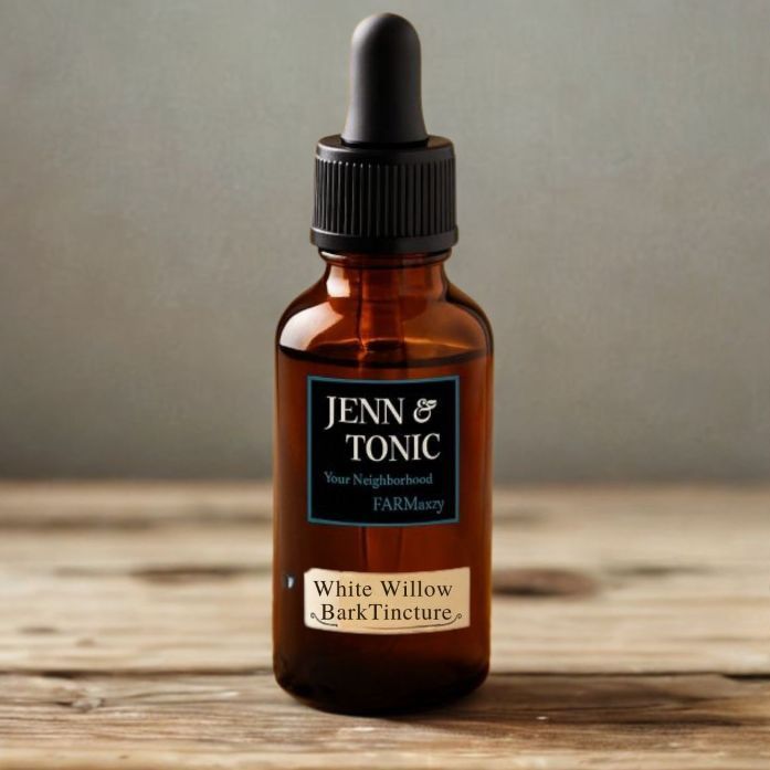 Amber glass dropper bottle labeled "Jenn & Tonic White Willow Bark Tincture" sitting on a rustic wooden surface.