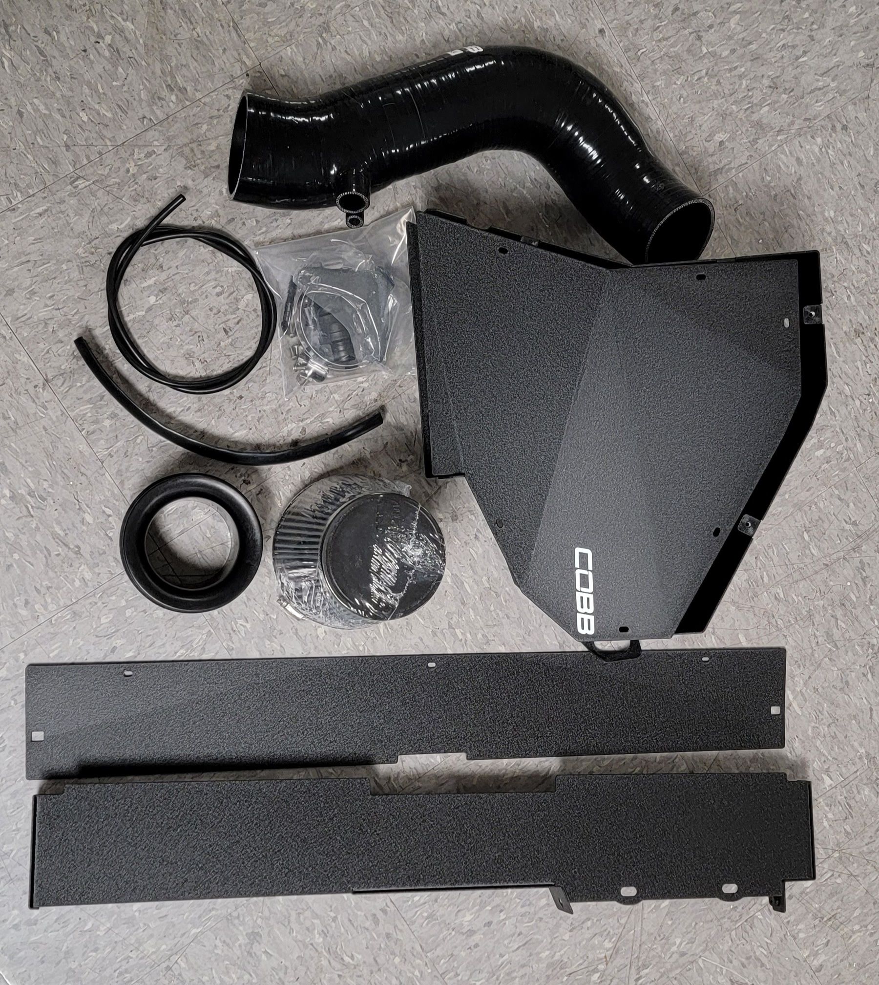 A black item with the word geico on it | Griffin Motorwerke