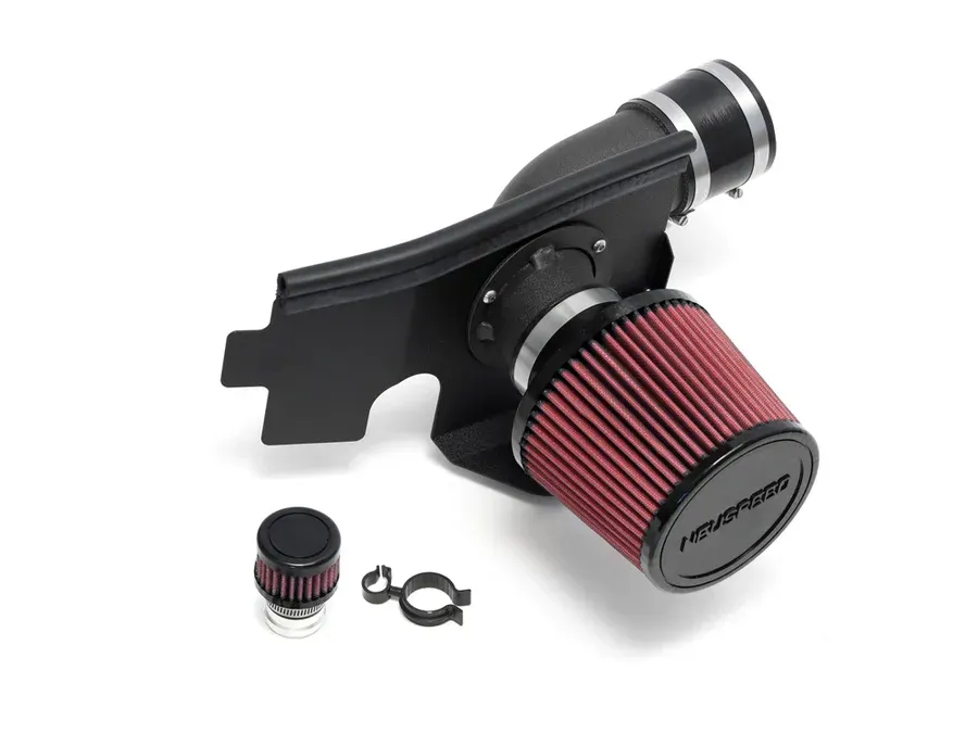 A close up of a red air filter on a white background | Griffin Motorwerke