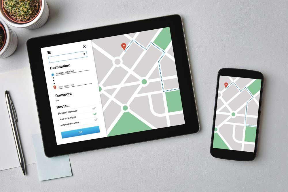 Location Tracker Concept On Tablet And Smartphone Screen