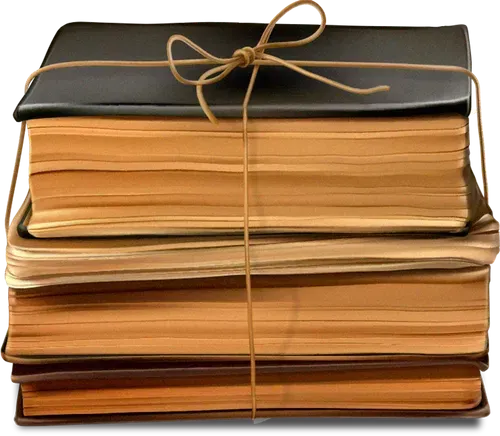 A stack of books tied together with string