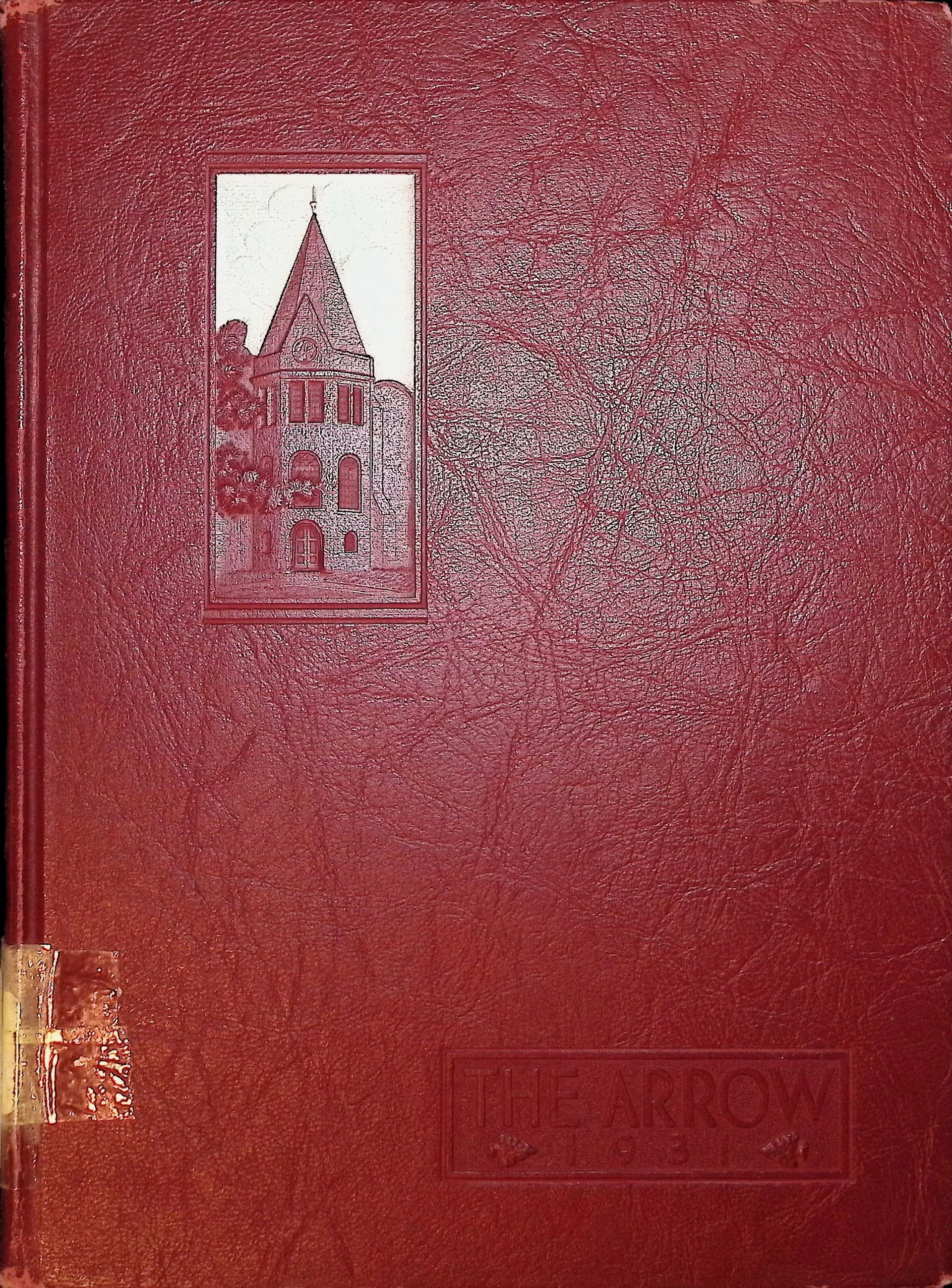 A red book with a picture of a castle on the cover