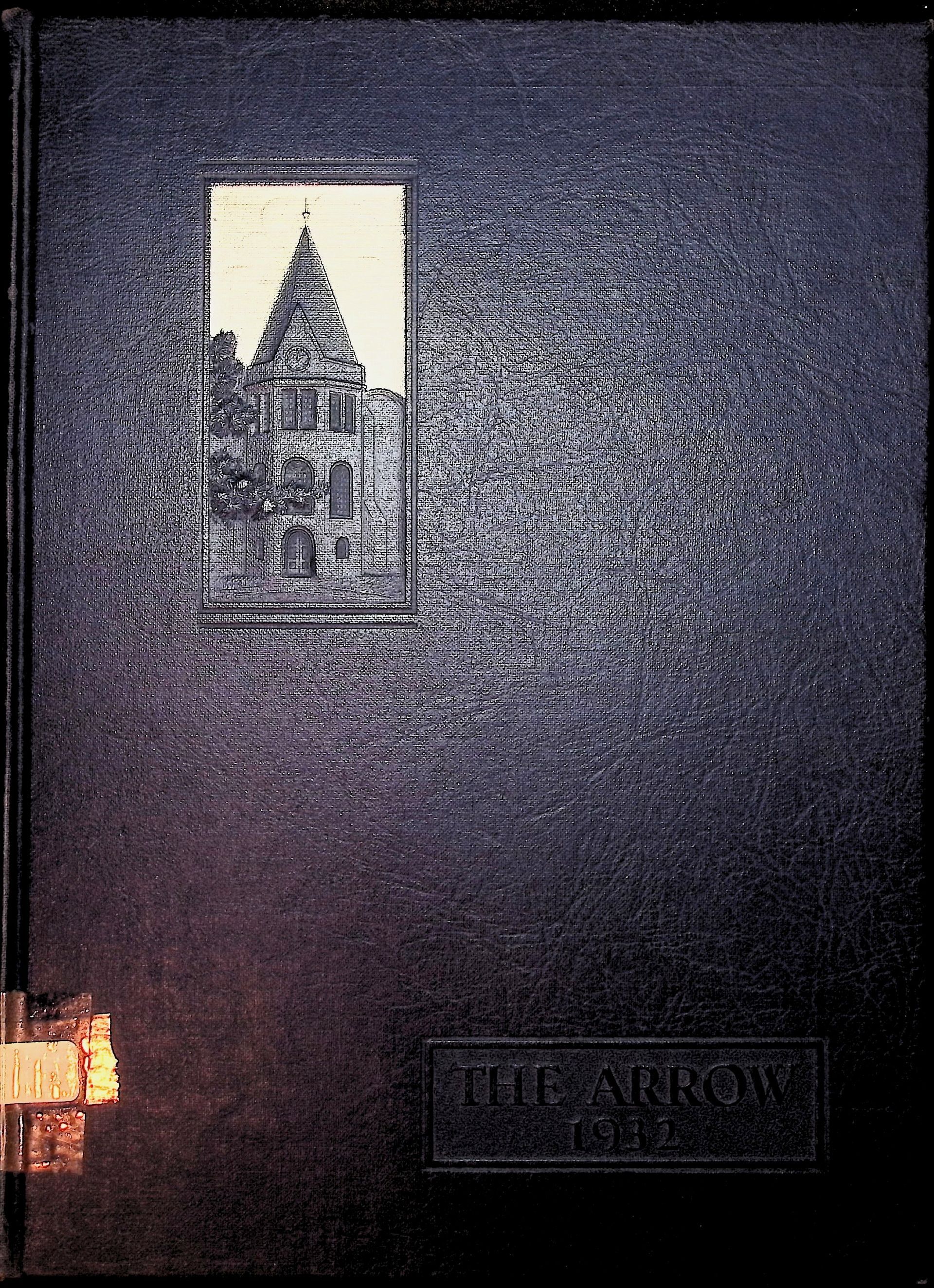 A black book with a picture of a building on the cover