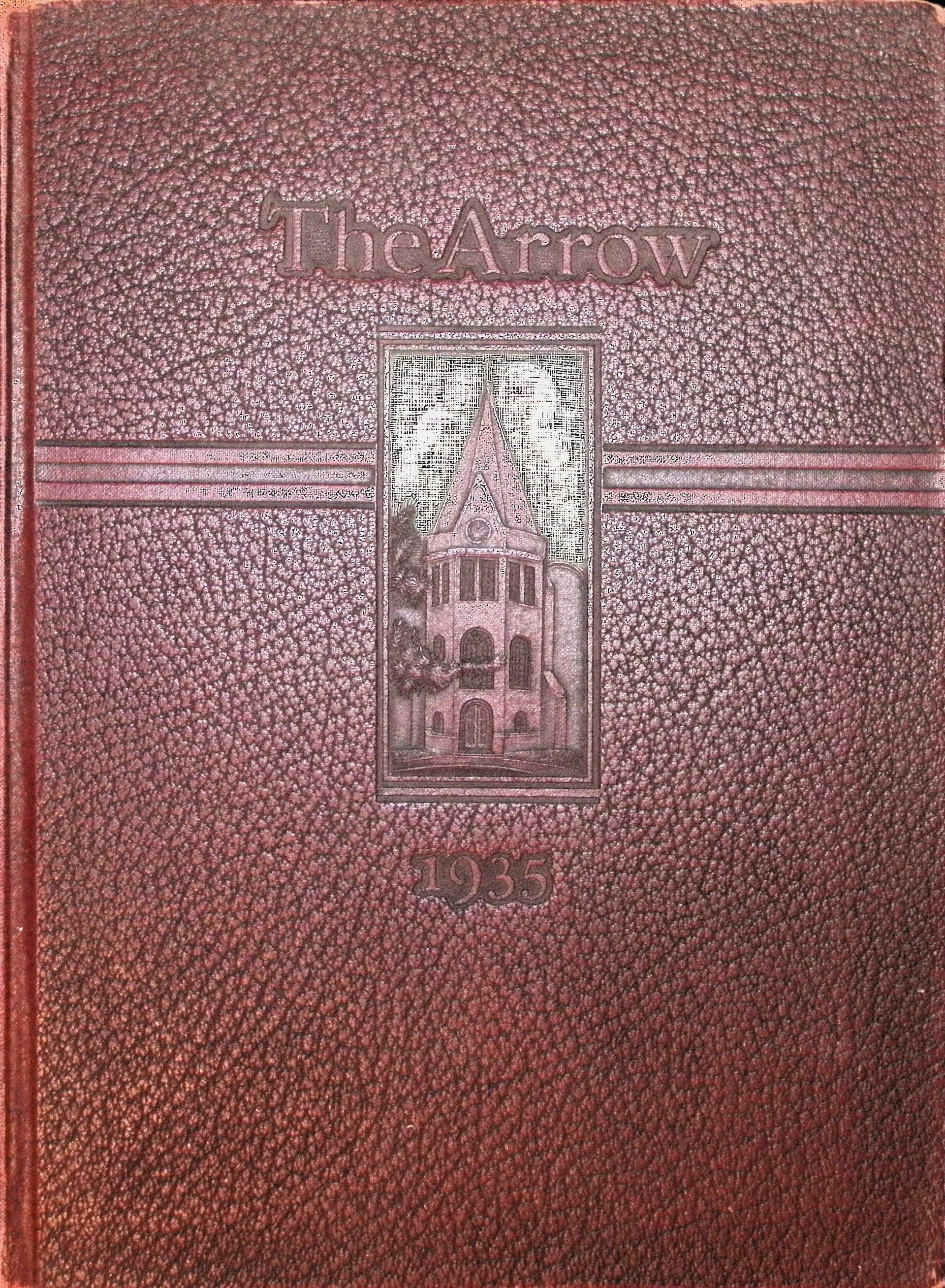 A brown book with a picture of a building on the cover