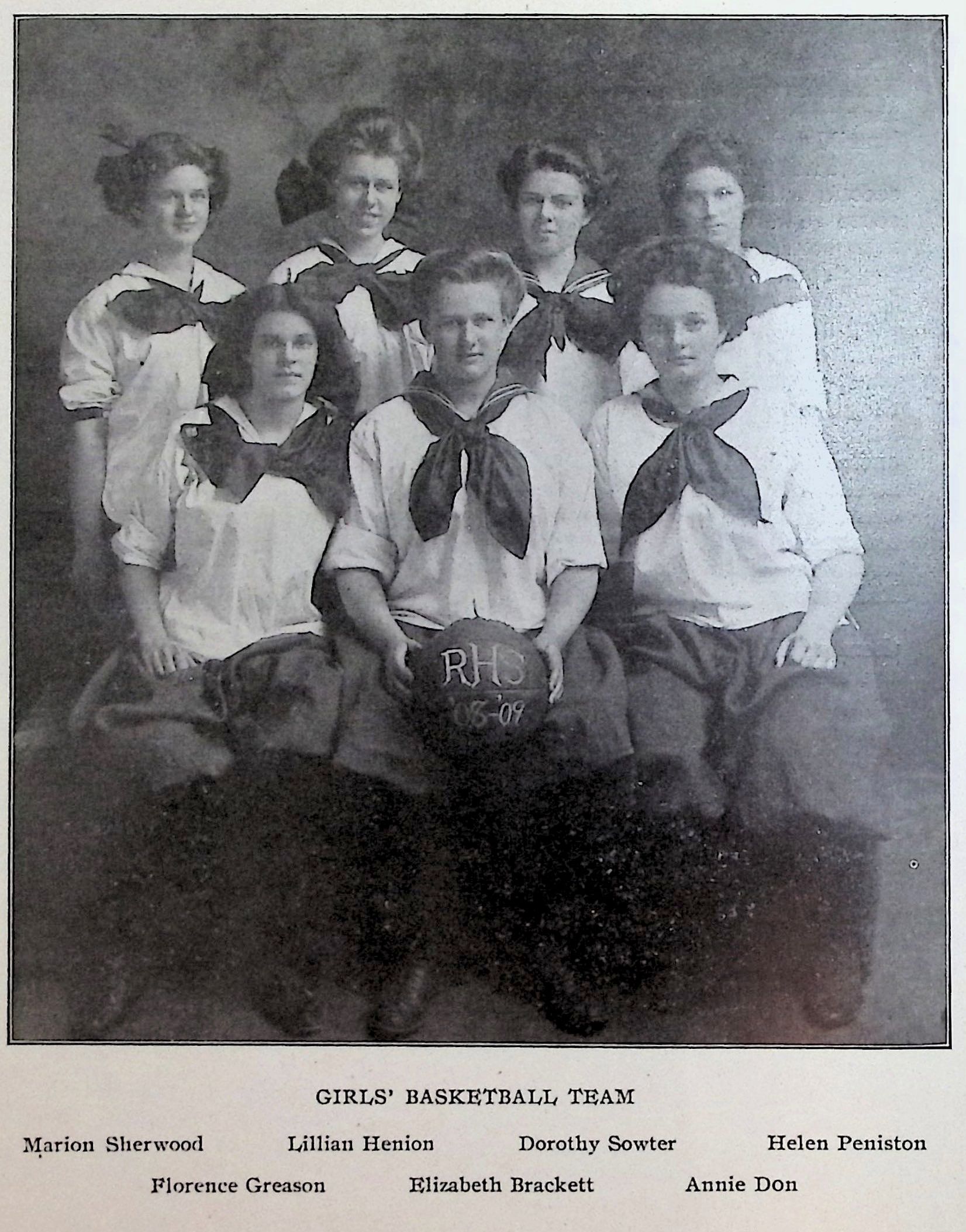 A black and white photo of a basketball team