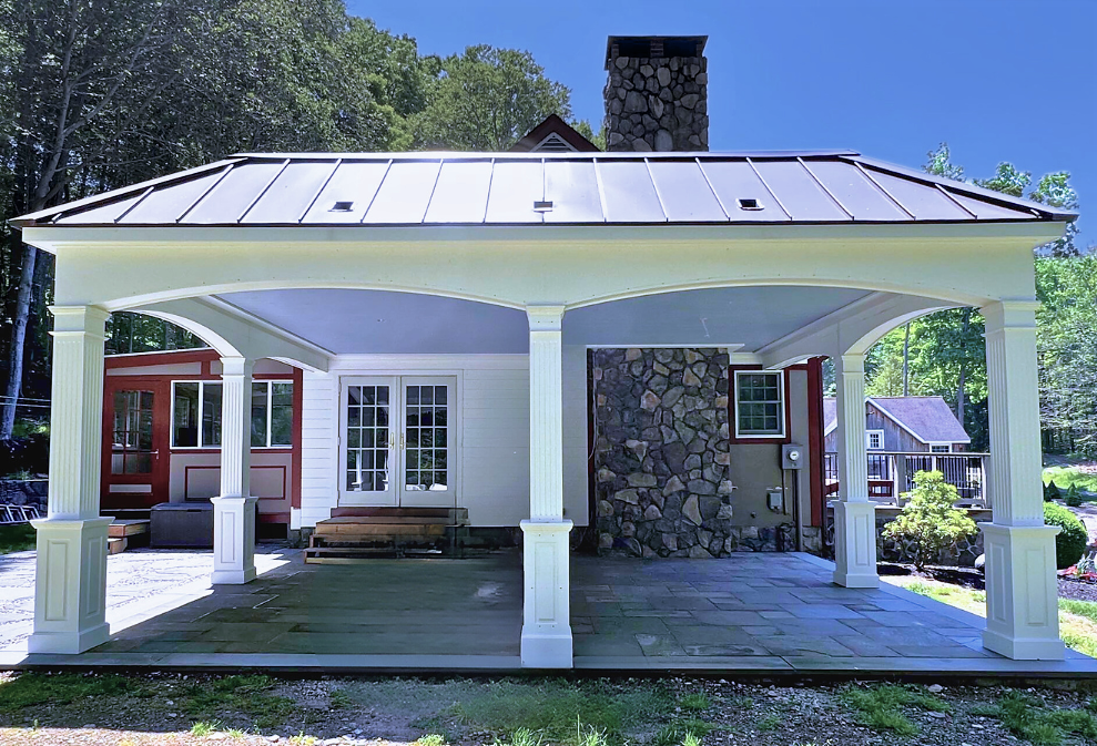 covered patio with ornate pillars