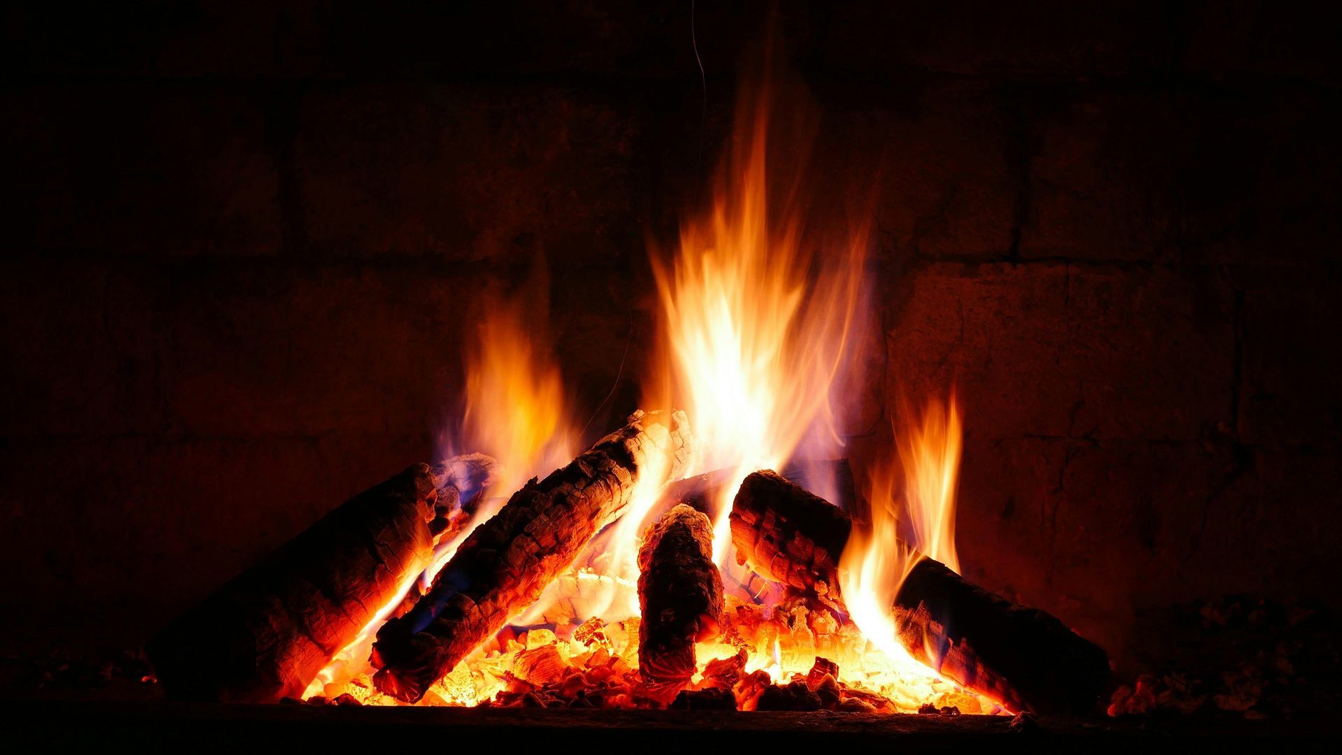 stack of firewood in fireplace in baltimore md