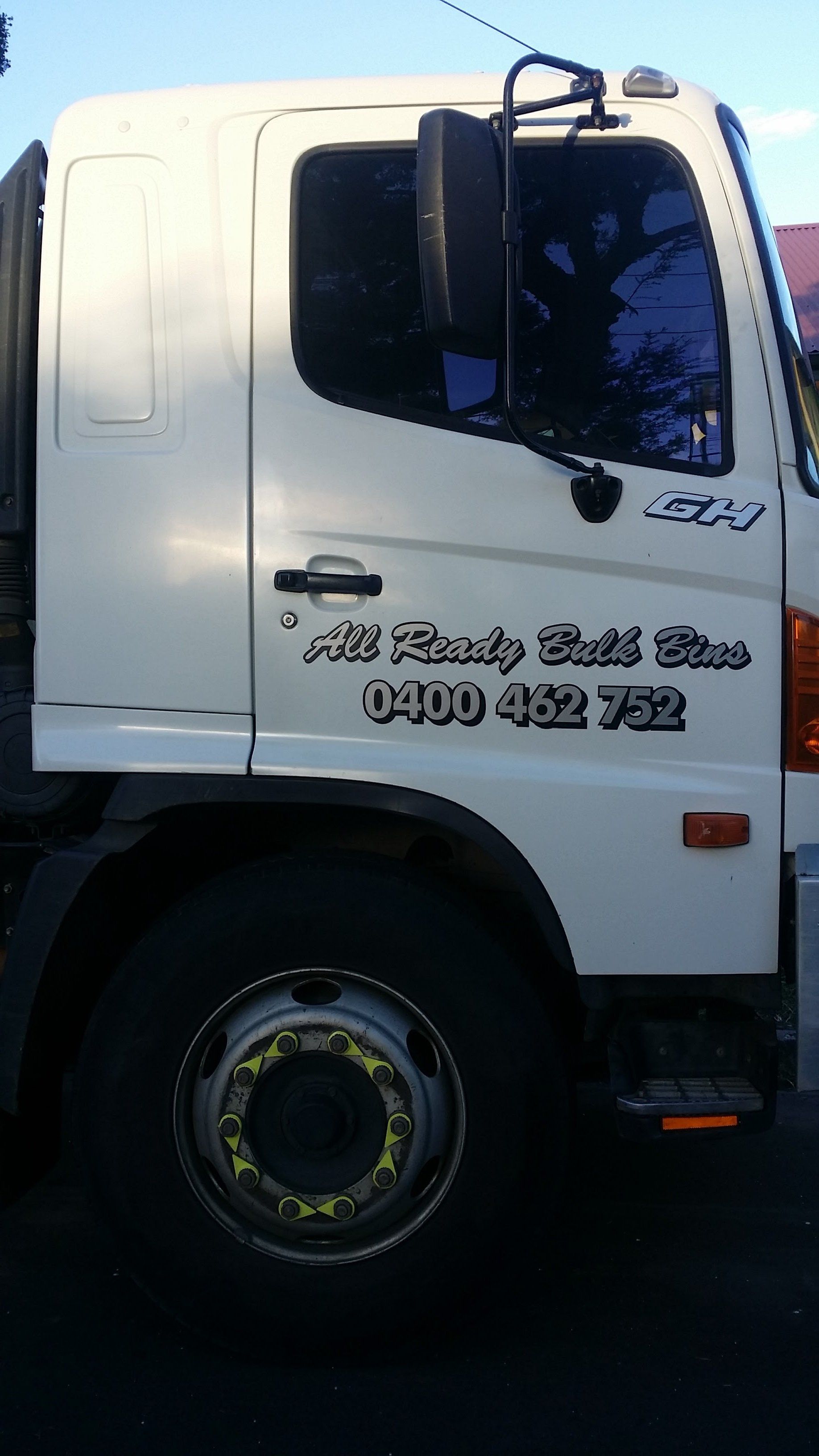 Throwing the Waste Bag into the Bin — Melbourne, VIC — All Ready Bulk Bins