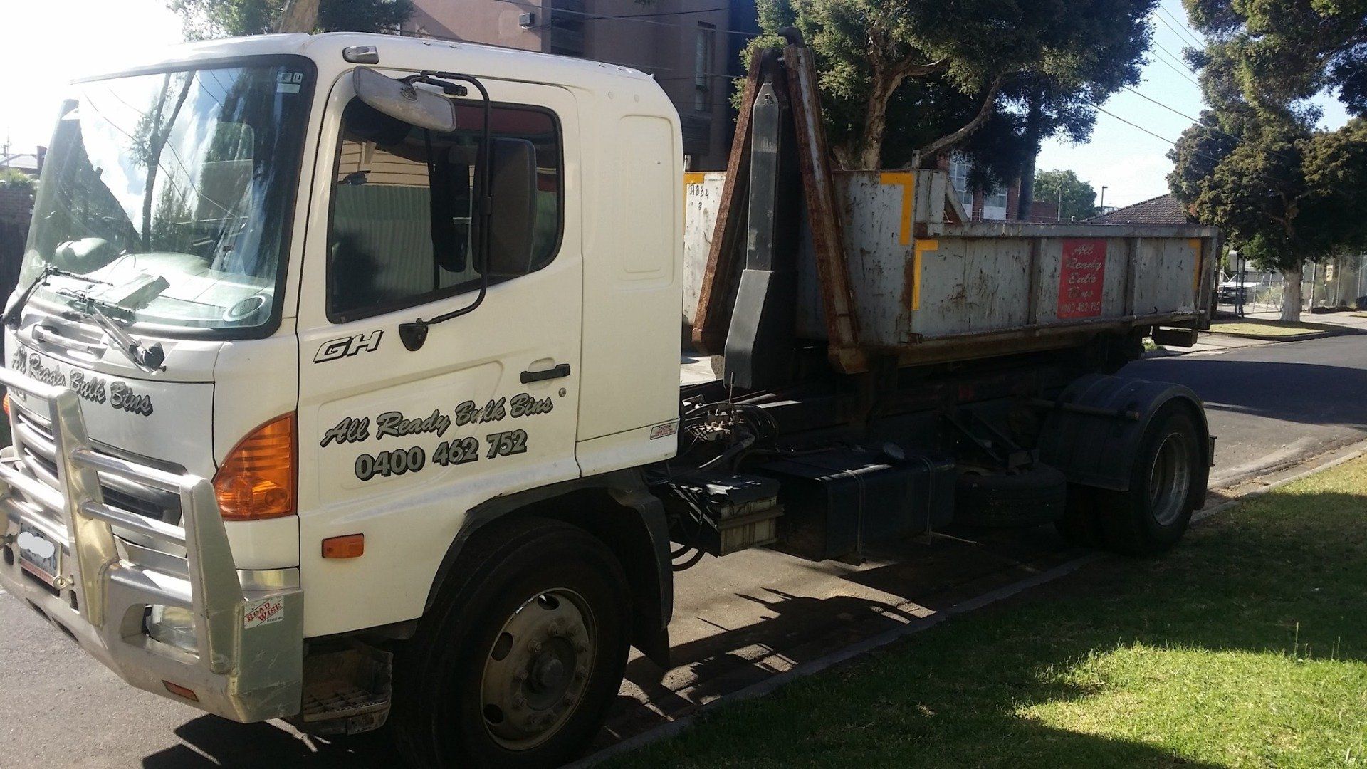 Dump Truck with Waste Disposal Bin