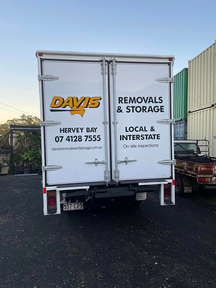The Back of a Davis Removals and Storage Truck is Parked in a Parking Lot — Davis Removals & Storage in Noosa Heads, QLD