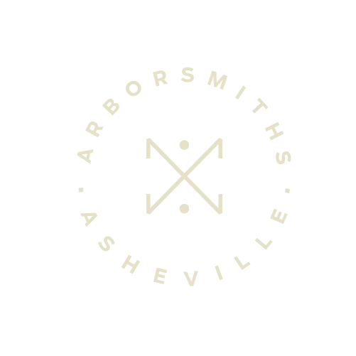 Logo for Arbor Smiths in Asheville. White text in a circle with crossed arrows.