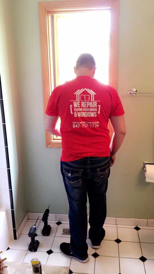 Man Repairing Window — Palatine, IL — Sliding Door & Window