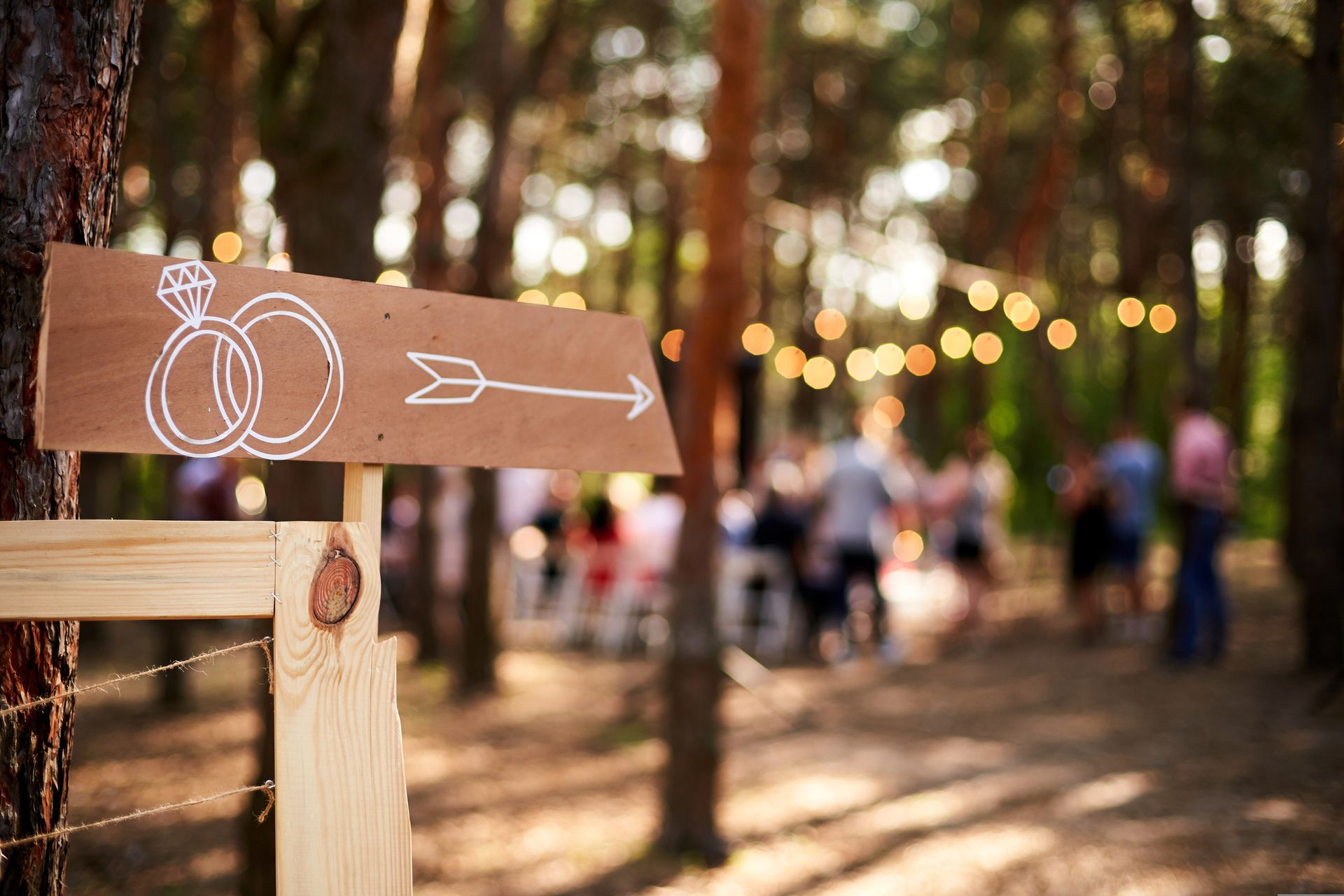 Wooden Arrow Sign With Wedding Rings — Jefferson, ME — Le Barn LLC