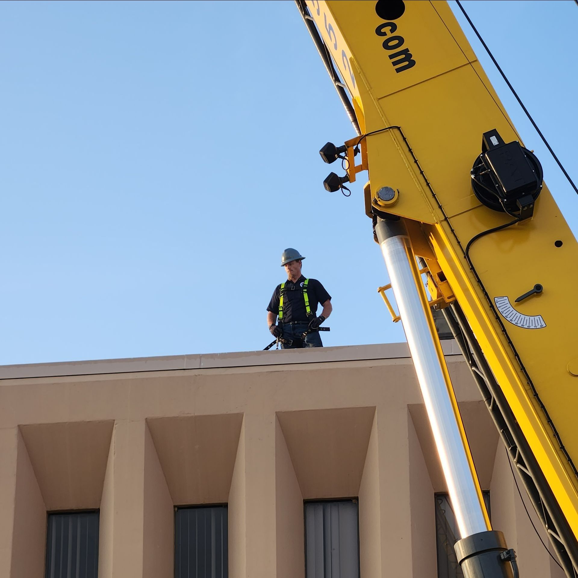 Man Using Tester On HVAC Unit — Houston, TX — Environmental Air Systems Man Using Tester On HVAC Unit — Houston, TX — Environmental Air Systems
