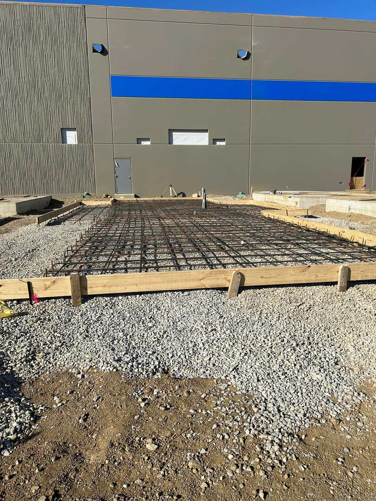 A Construction Site With A Building In The Background — Chesterton, IN — Claycor Construction