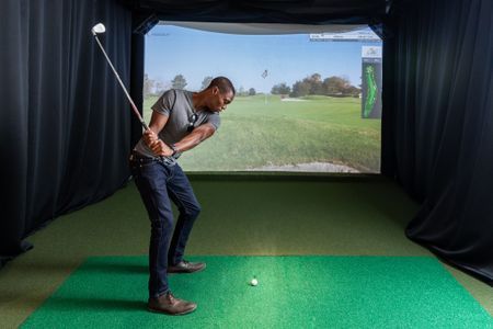 Golf simulator at The Q.