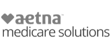 A black and white logo for aetna medicare solutions.