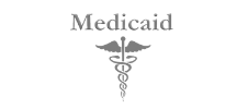 The logo for medicaid is a caduceus with wings and snakes.
