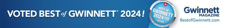 A blue sign that says voted best gwinnett 2024
