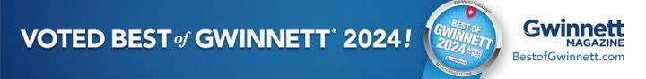 A blue sign that says voted best gwinnett 2024