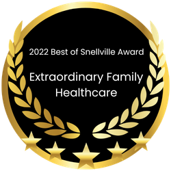 A black and gold circle with a laurel wreath on it that says `` best of snelville award extraordinary family healthcare ''.