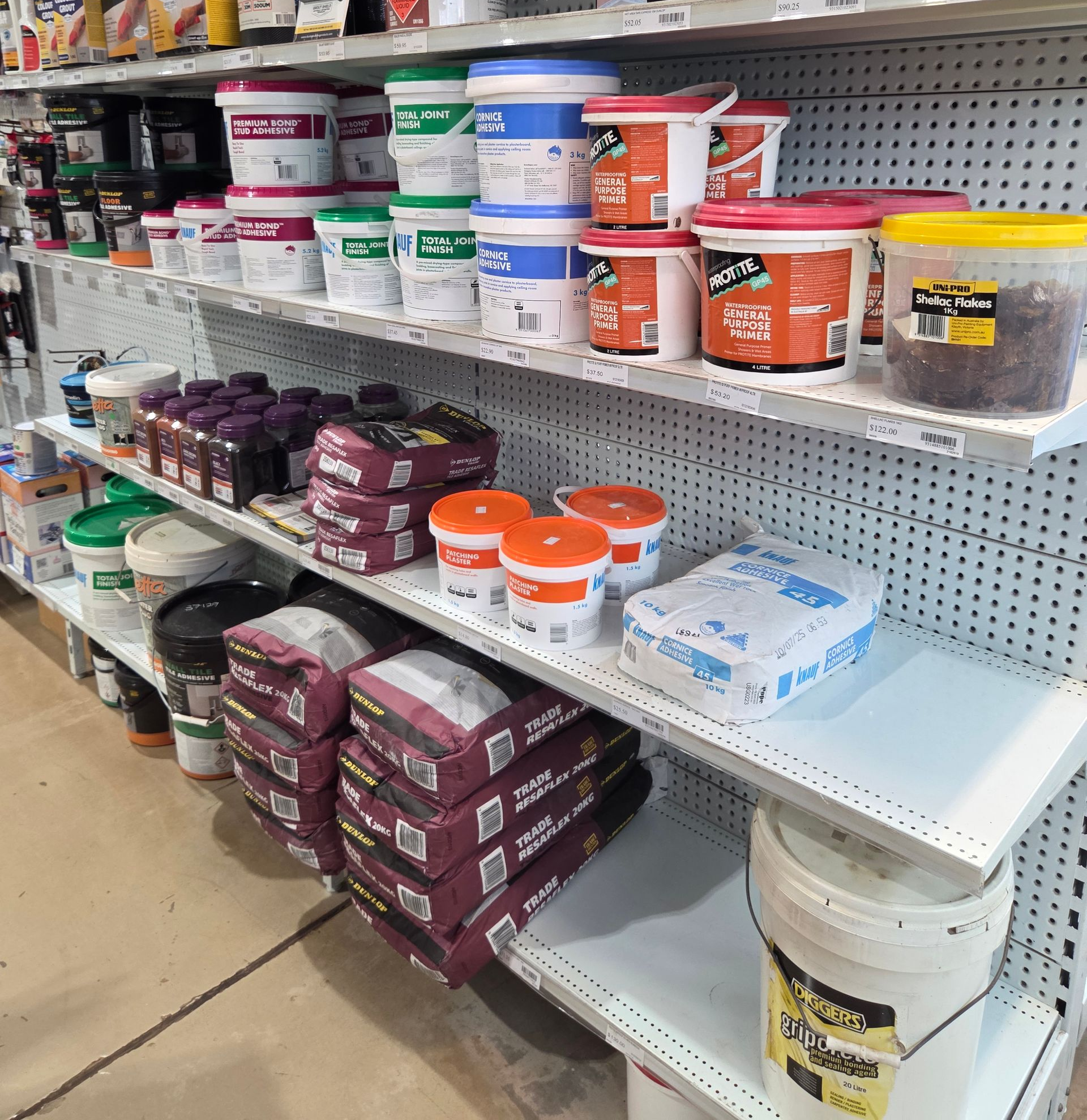 Shelves Stocked With Various Plastic Tubs and Bags of Construction Materials — Humpty Doo Hardware in Humpty Doo, NT