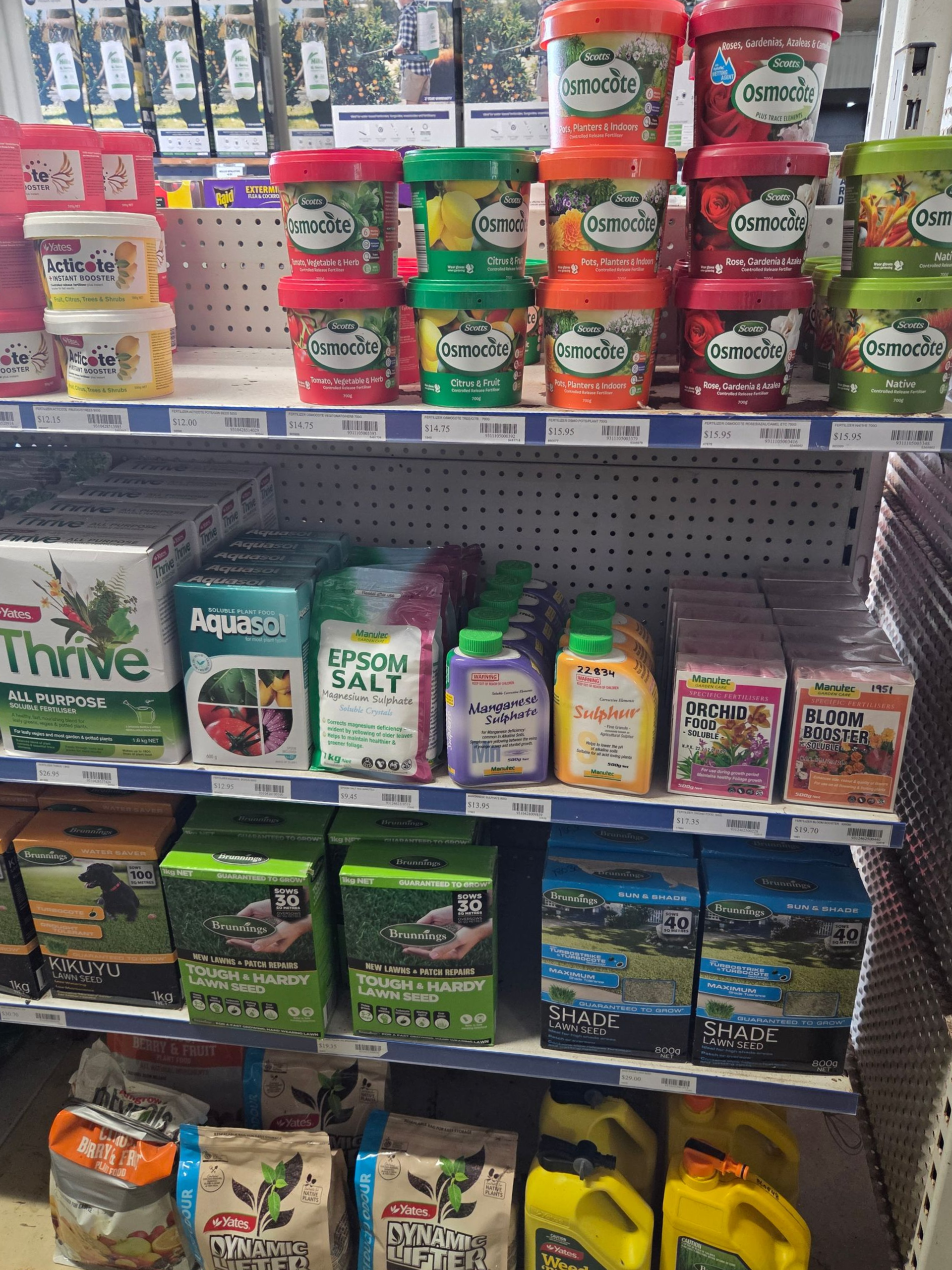 Store Shelves Stocked With Various Containers of Plant Fertilizers — Humpty Doo Hardware in Humpty Doo, NT