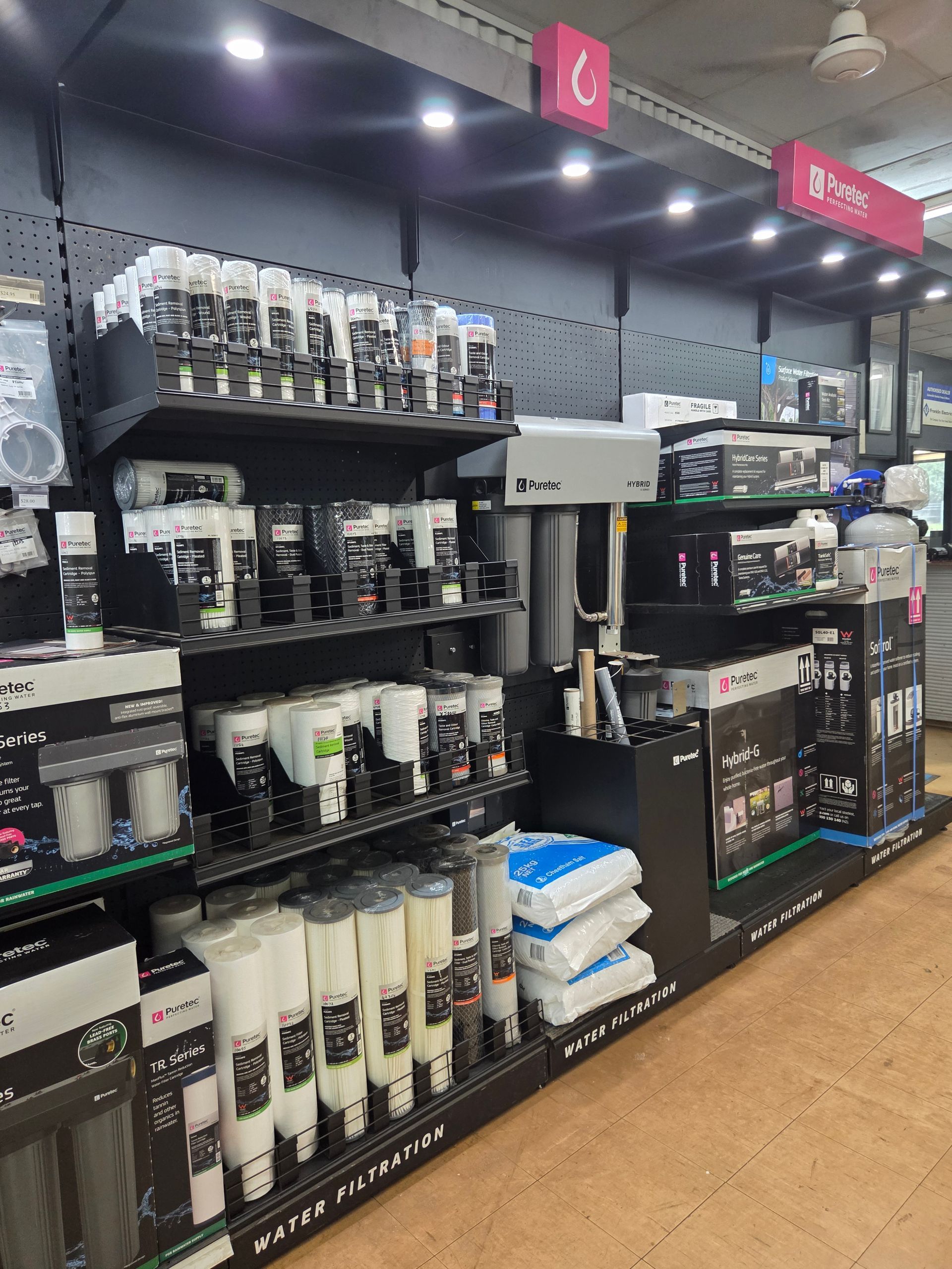 Retail Store Shelf Display Showcasing Various Water Filtration System Products — Humpty Doo Hardware in Humpty Doo, NT
