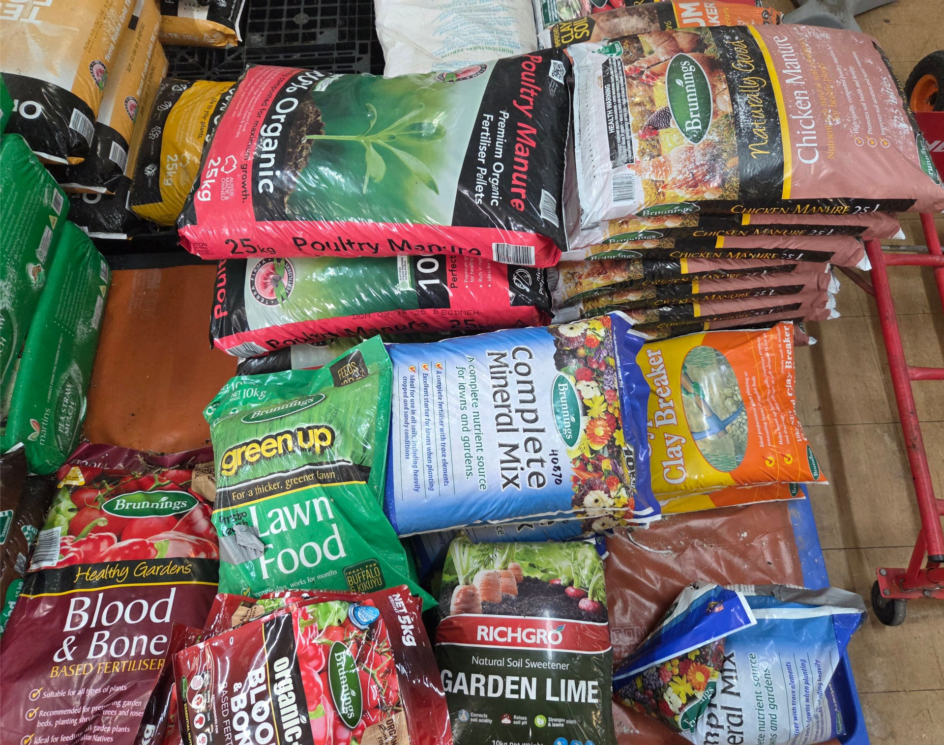 Stacked Bags of Gardening Supplies and Fertilizers — Humpty Doo Hardware in Humpty Doo, NT