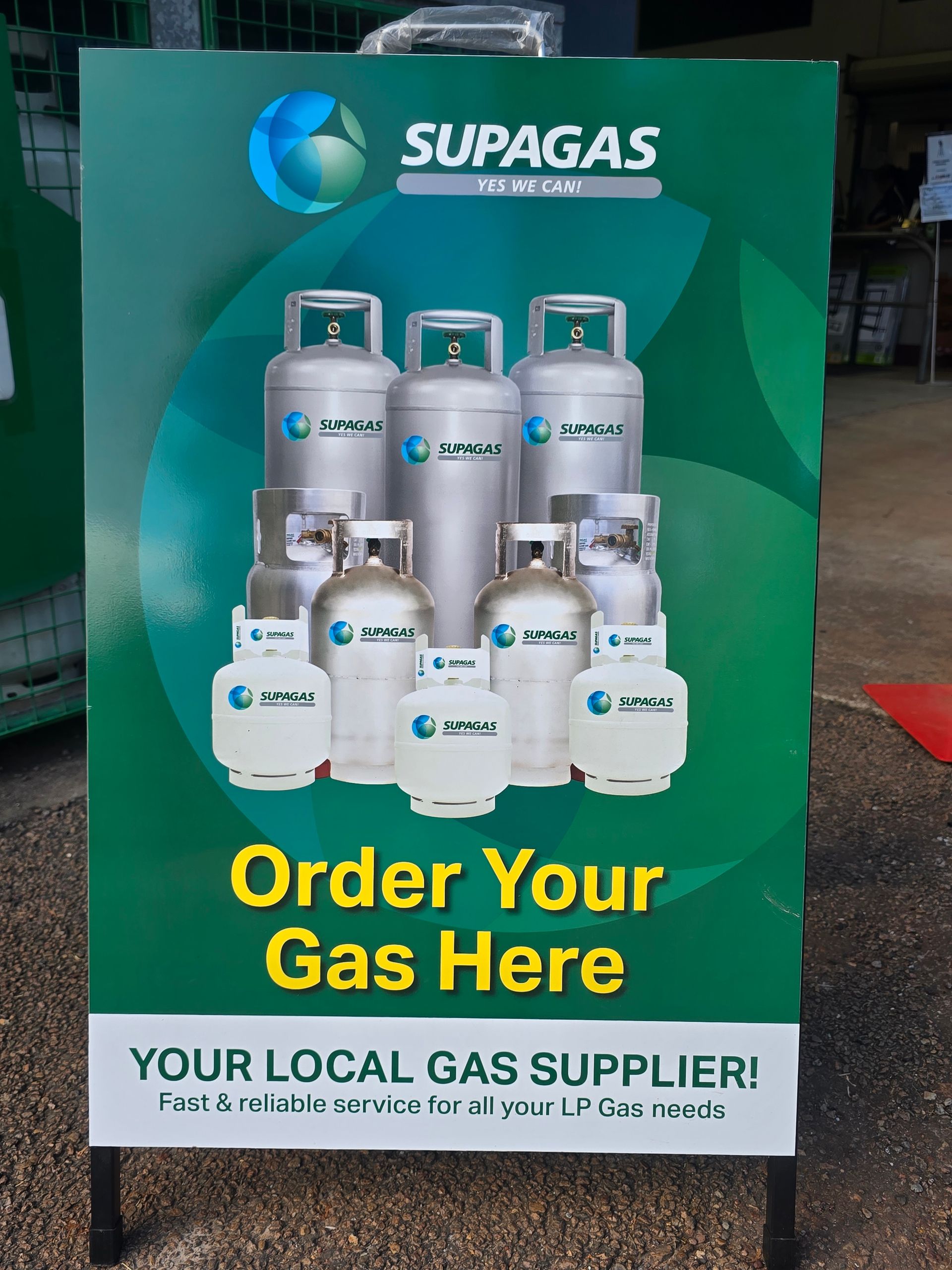 SUPAGAS promotional poster with gas cylinders and text, “Order Your Gas Here” and “Your Local Gas Supplier” — Humpty Doo Hardware in Humpty Doo, NT