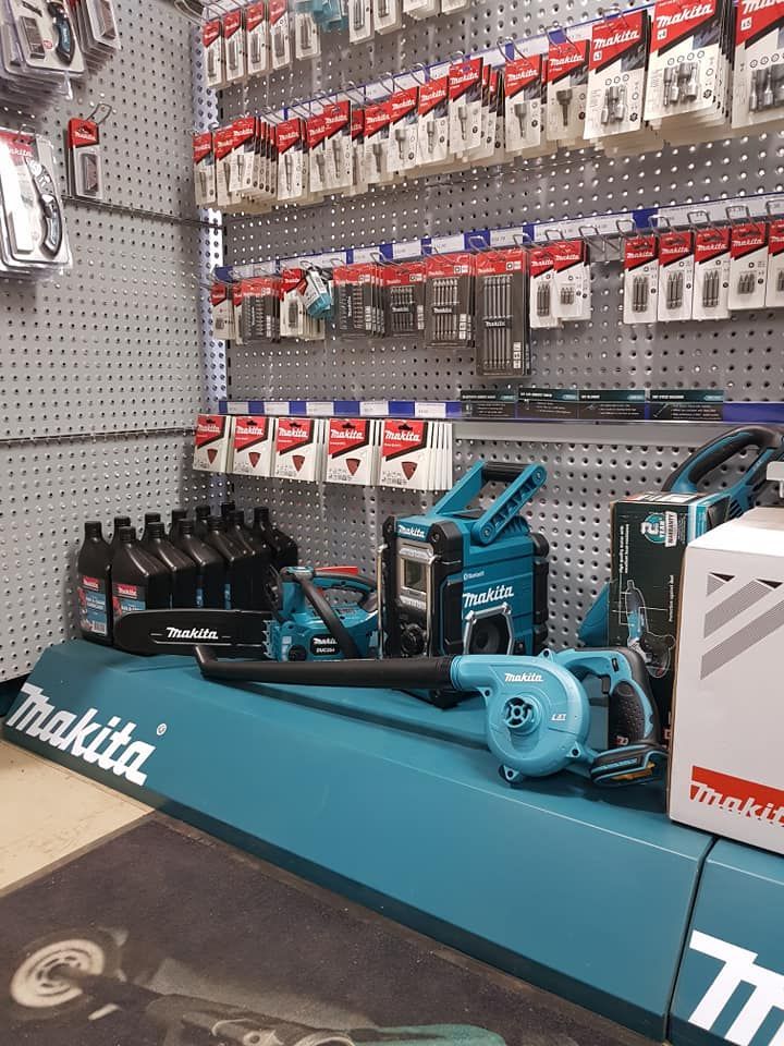 A Retail Shelf Displaying Teal-coloured Makita Power Tools — Humpty Doo Hardware in Humpty Doo, NT