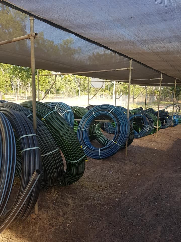 Large Coils of Black and Blue Irrigation Tubing — Humpty Doo Hardware in Humpty Doo, NT