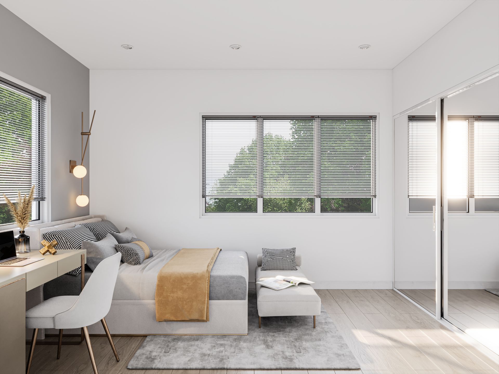 A bright, modern bedroom with a bed, desk, chair, ottoman, and mirrored closet, featuring gray and neutral tones.
