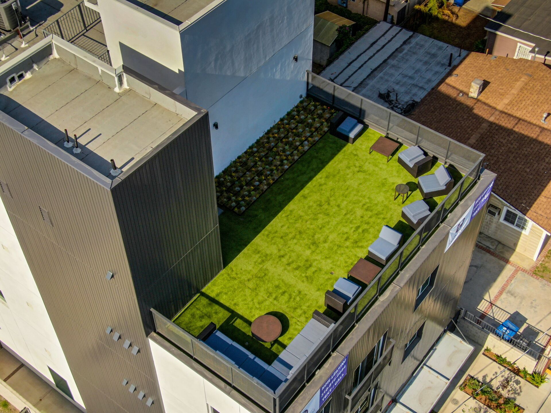 This image shows the sitting area on the roof of a big house.