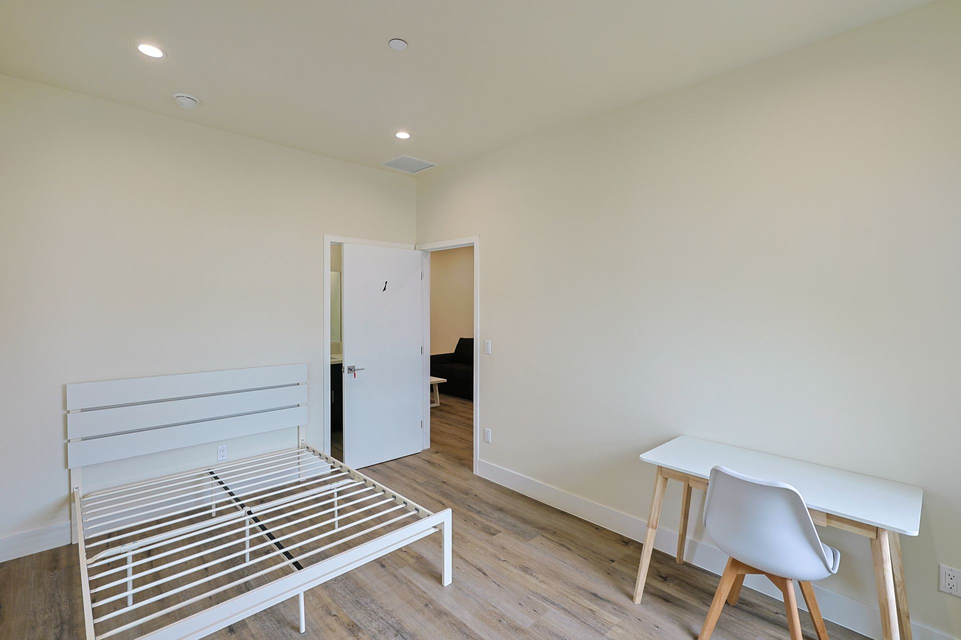 this image shows a bedroom of a small house with white background