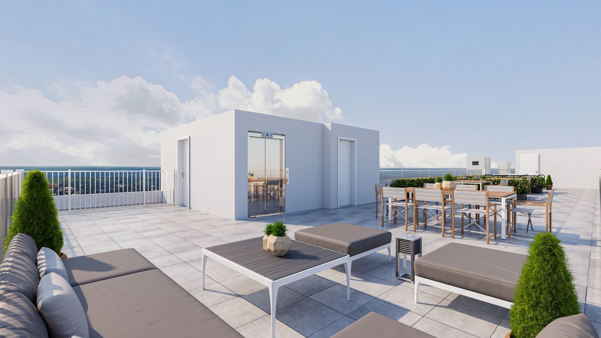 A sunlit rooftop terrace with grey modular patio furniture, a dining set, potted shrubs, and a clear blue sky.