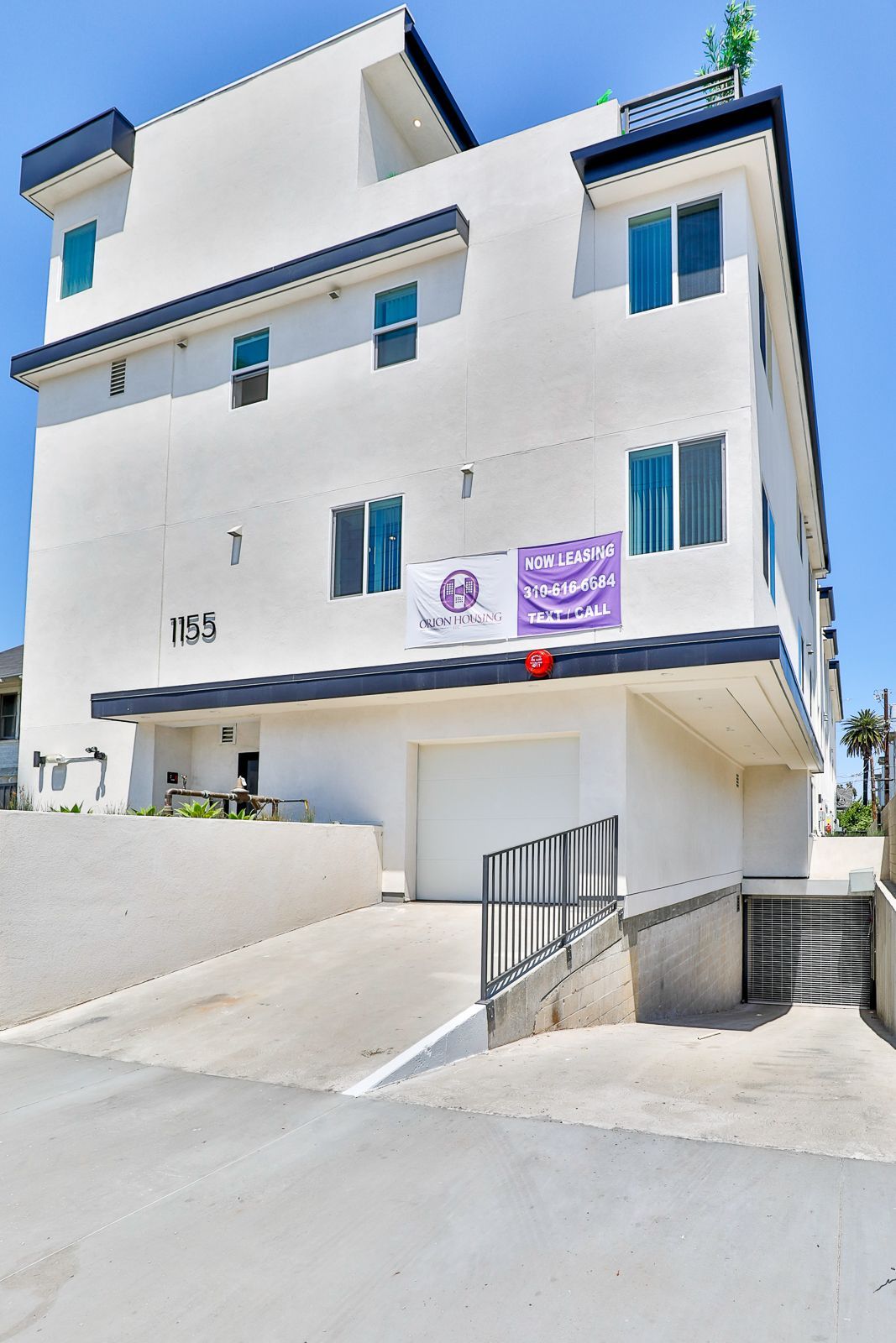 This image shows a white color double story house