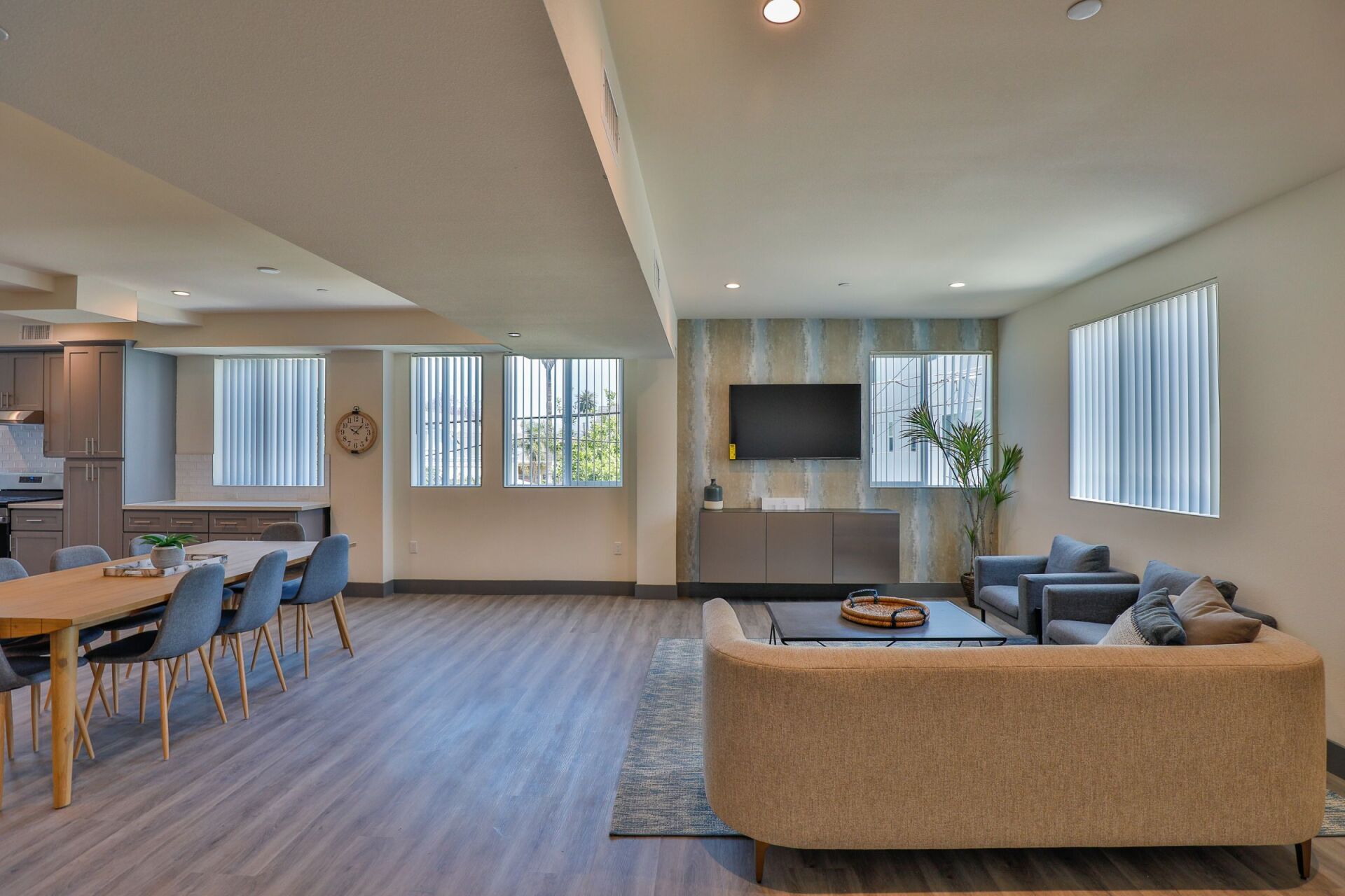 this image shows a beautifull living room having brown and gray theme