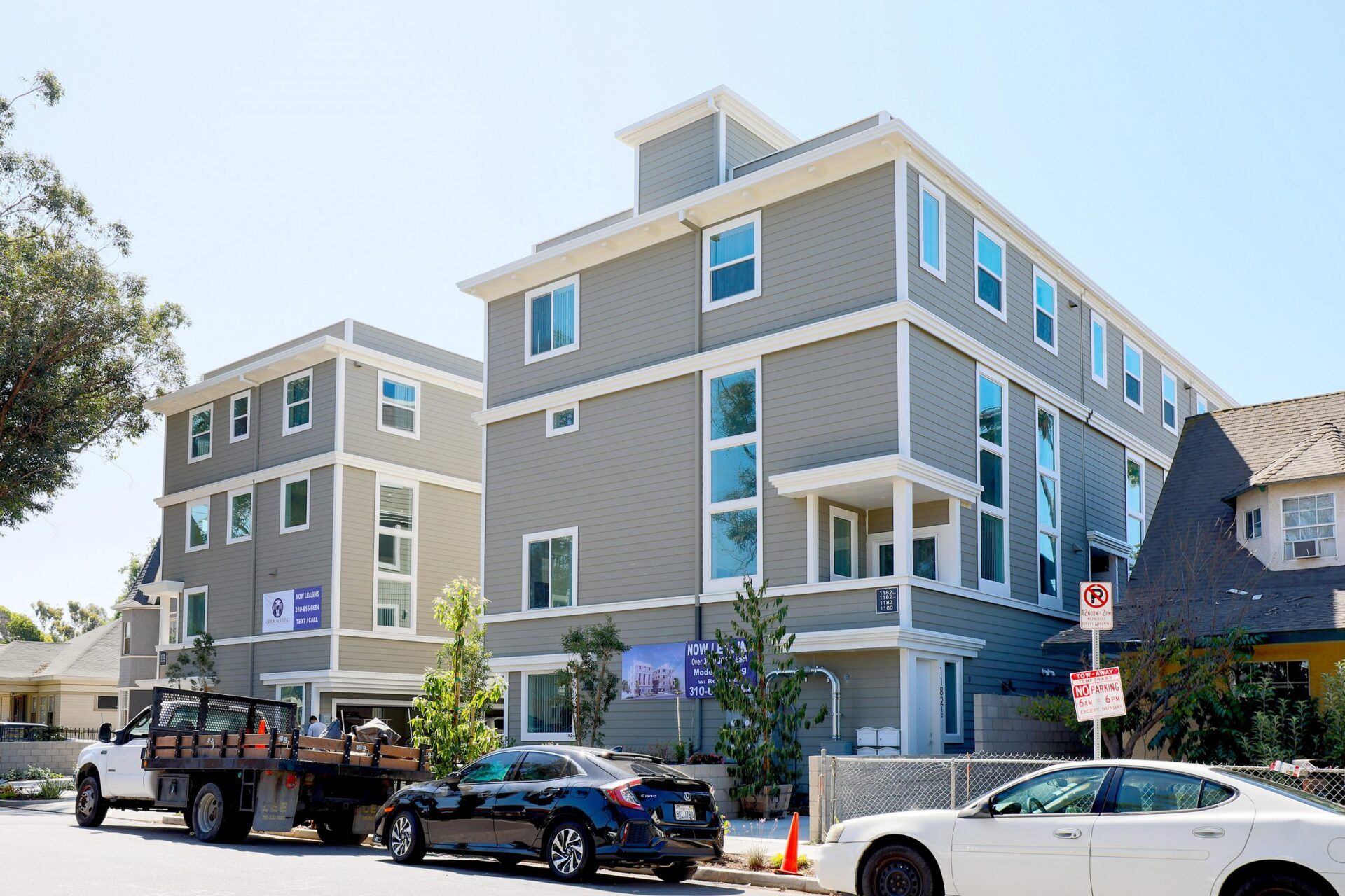 this image shows a tribble portion large buildings with grey and skyblue background