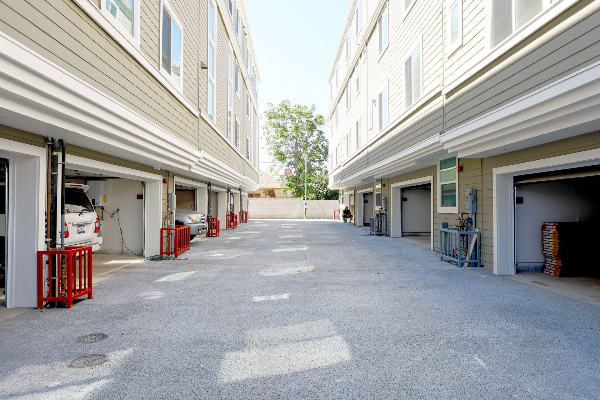 this image show a street between two buildings