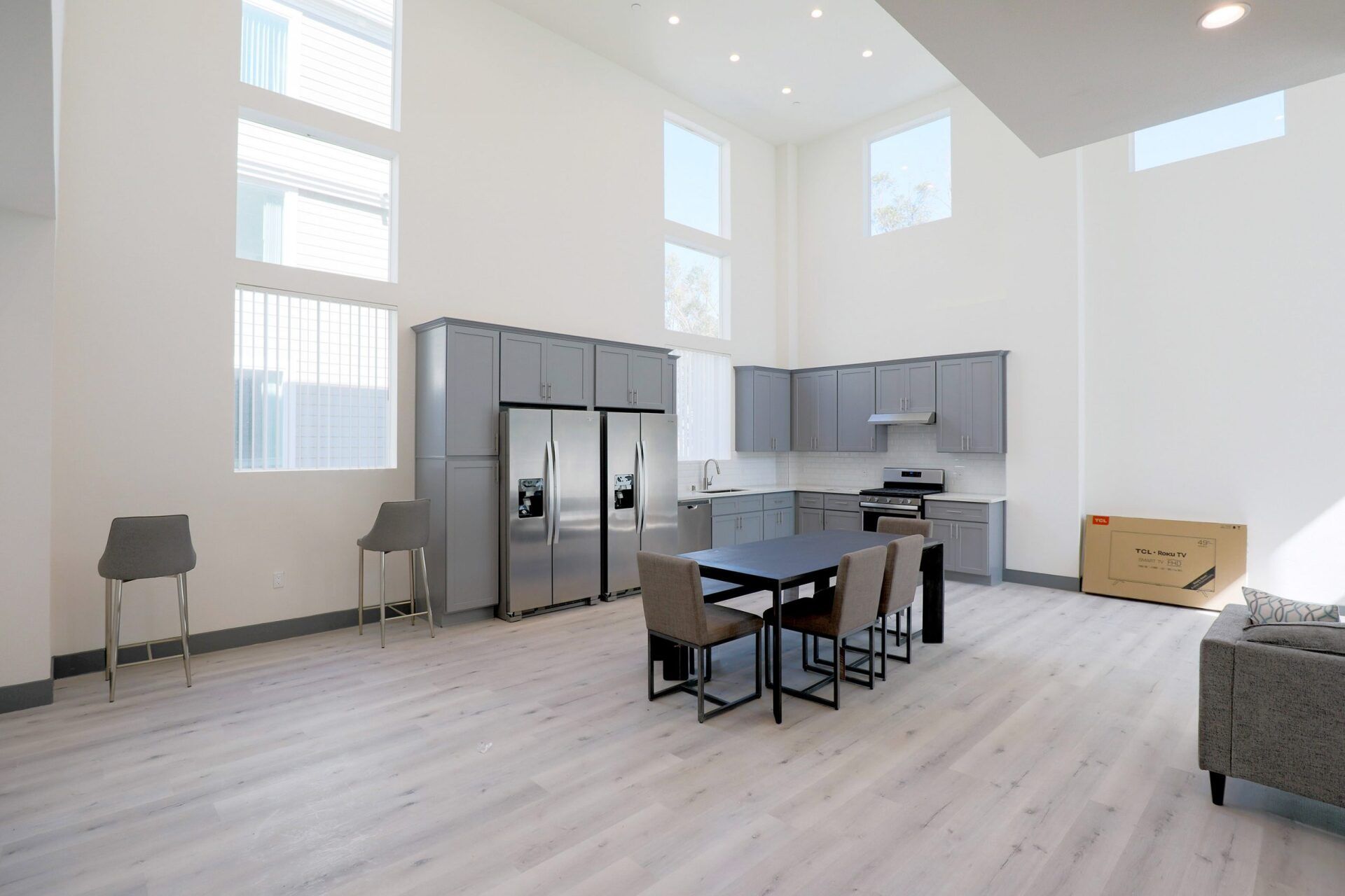 this image shows a small kichen with dining table